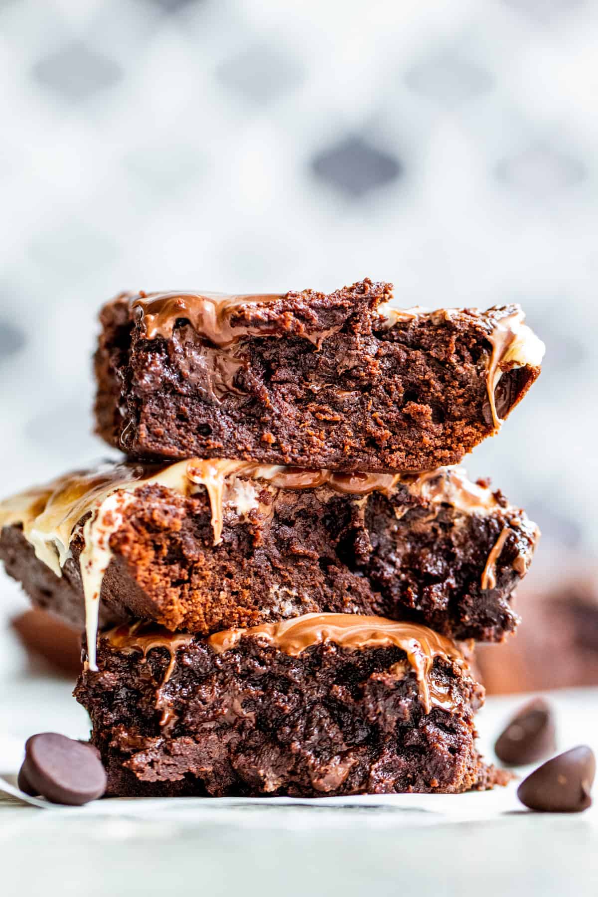 Strait on shot of fudge brownies in stack of three.