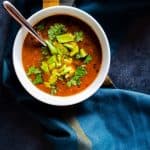 The BEST simple Spicy Vegan Black Bean Soup recipe. This meal is quick and ready in 30 minutes making it a perfect weeknight dinner recipe. This soup made from scratch, healthy, and has great Mexican spices and flavors incorporated. #soup #blackbeansoup #30minutemeal #dinner #simple #vegan #glutenfree #nutfree #easyrecipe