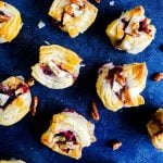 These Blackberry Brie Bites with Pecan Sage topping are the best simple, fast holiday appetizer recipe. Ready in 20 minutes and easy to hold size makes this Thanksgiving and Christmas recipe the best. #appetizer #recipe #holidays #Thanksgiving #Christmas