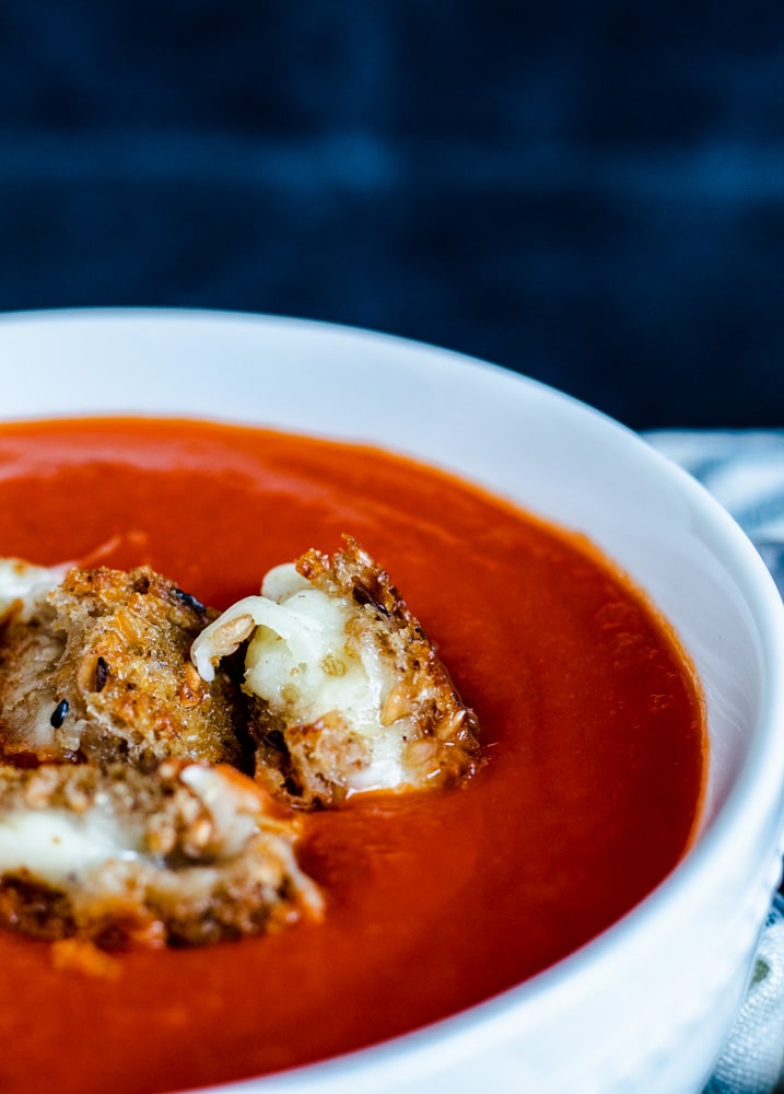 Close up shot of soup in white bowl.