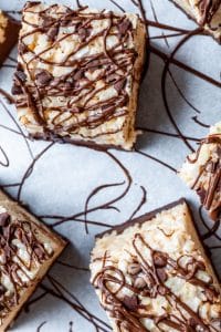 Overhead shot of nutella rice krispie treats on white parchment paper. 