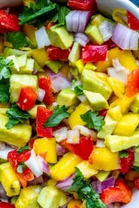 Close up of salsa chopped in bowl. 