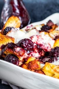 Close up shot of french toast in white baking dish.