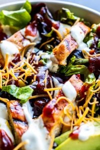 Close up shot of salad in white bowl.