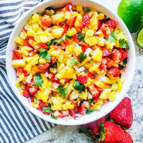 Overhead shot of salsa in a white bowl.