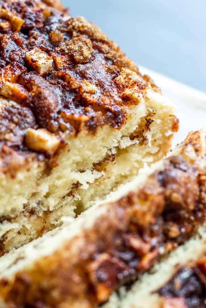 Close up of bread on a marble cutting board.