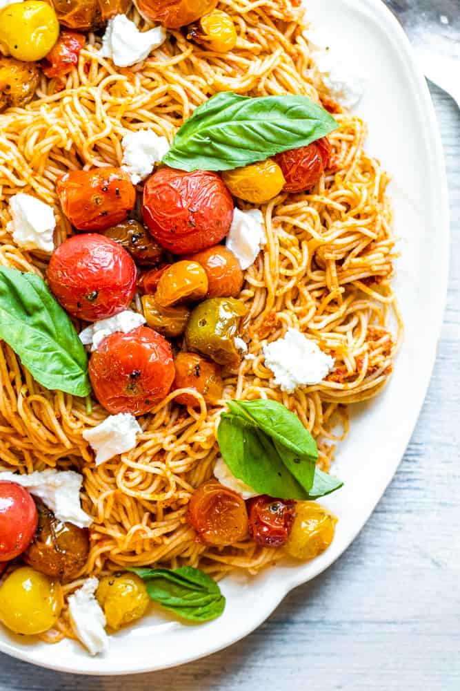 Overhead shot of pasta on a white dish.