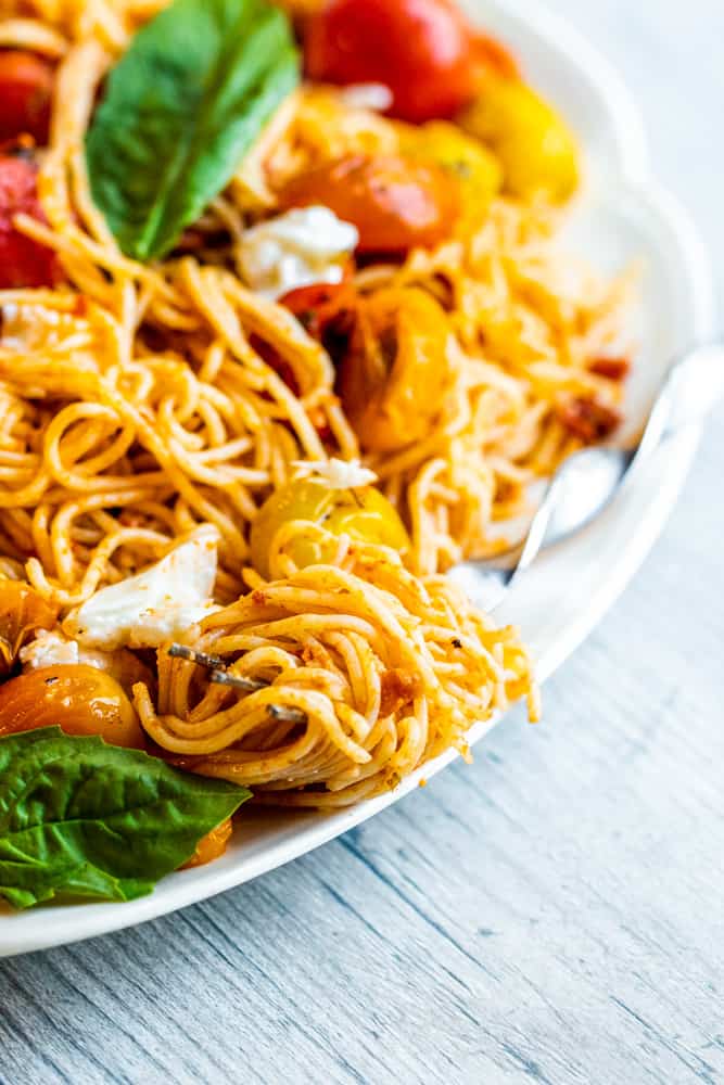 Pasta twisted on a silver fork.