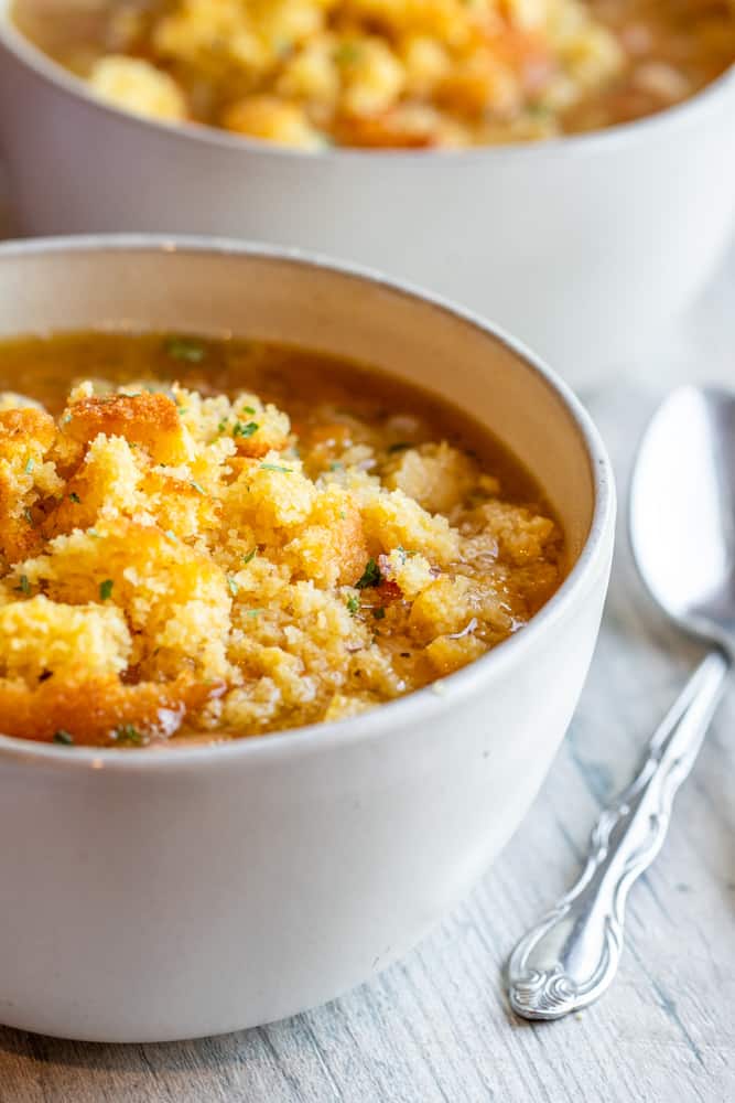 White bowl filled with soup.