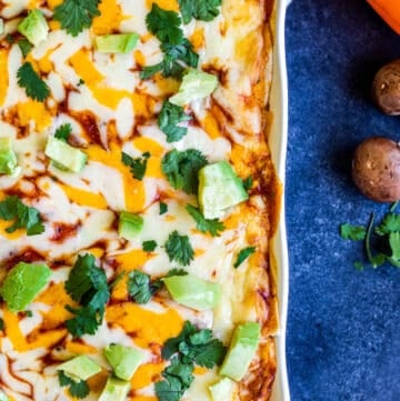 Overhead shot of lasagna in white dish.